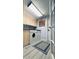 Laundry room featuring a washer and dryer at 1964 Arvis E Cir, Clearwater, FL 33764