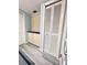 Laundry room featuring storage cabinets and a closet at 1964 Arvis E Cir, Clearwater, FL 33764