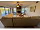 Gathering room with fireplace, views of the water, and comfortable seating at 1964 Arvis E Cir, Clearwater, FL 33764
