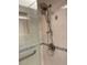 Close up of the shower head and hardware in the bathroom at 1964 Arvis E Cir, Clearwater, FL 33764