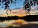 Beautiful sunset over the water, reflecting the serene beauty of the community at 1964 Arvis E Cir, Clearwater, FL 33764
