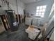 Unfinished laundry room with washer, dryer, and water heater at 433 89Th Ave, St Pete Beach, FL 33706