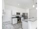 Modern kitchen with stainless steel appliances and granite counters at 7535 62Nd N Way, Pinellas Park, FL 33781