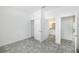 Bright bedroom with grey vinyl flooring and an ensuite bathroom at 7535 62Nd N Way, Pinellas Park, FL 33781