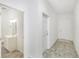 Bright hallway with access to bathroom and another room at 7535 62Nd N Way, Pinellas Park, FL 33781