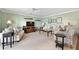 Spacious living room with light beige sofa and a flat-screen TV at 5257 Beach Se Dr # D, St Petersburg, FL 33705