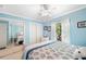 Bright bedroom with a king-size bed and mirrored closet doors at 5257 Beach Se Dr # D, St Petersburg, FL 33705