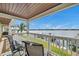 Balcony with water views and seating at 5257 Beach Se Dr # D, St Petersburg, FL 33705