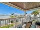 Balcony with water view and patio furniture at 5257 Beach Se Dr # D, St Petersburg, FL 33705