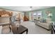 Relaxing living room with access to a balcony and water view at 5257 Beach Se Dr # D, St Petersburg, FL 33705