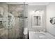 Bathroom with shower, vanity, and mermaid etching at 5257 Beach Se Dr # D, St Petersburg, FL 33705
