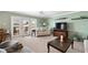 Living room with comfortable seating and access to balcony at 5257 Beach Se Dr # D, St Petersburg, FL 33705