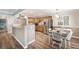 Modern kitchen with stainless steel appliances and granite counters at 5257 Beach Se Dr # D, St Petersburg, FL 33705