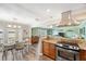 Bright kitchen with stainless steel appliances and granite countertops at 5257 Beach Se Dr # D, St Petersburg, FL 33705