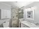 Bathroom with shower, vanity, and toilet at 5257 Beach Se Dr # D, St Petersburg, FL 33705