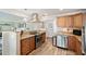 Modern kitchen with stainless steel appliances and granite countertops at 5257 Beach Se Dr # D, St Petersburg, FL 33705