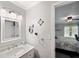 Bathroom with vanity and view of bedroom at 5257 Beach Se Dr # D, St Petersburg, FL 33705