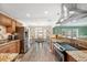 Updated kitchen with stainless steel appliances and granite countertops at 5257 Beach Se Dr # D, St Petersburg, FL 33705