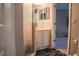 Bathroom with a shower, vanity, and access to bedroom at 7323 Night Heron Dr, Land O Lakes, FL 34637