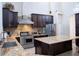Spacious kitchen with granite countertops and stainless steel appliances at 7323 Night Heron Dr, Land O Lakes, FL 34637