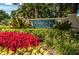 Community entrance with a sign for Pointe Alexis Deed Restricted at 1008 Caravel Ct, Tarpon Springs, FL 34689