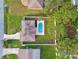 An aerial view of a home with a pool at 831 Searcy Ave, Sarasota, FL 34237