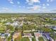 Aerial view of home with pool and neighborhood at 831 Searcy Ave, Sarasota, FL 34237