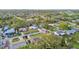 Aerial view of a residential area with homes and greenery at 831 Searcy Ave, Sarasota, FL 34237