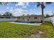 Large backyard with private pool and grassy area at 831 Searcy Ave, Sarasota, FL 34237