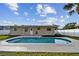 Relax and enjoy your private kidney-shaped pool in this backyard oasis at 831 Searcy Ave, Sarasota, FL 34237