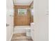Clean bathroom with a shower/tub combo, toilet and vanity at 831 Searcy Ave, Sarasota, FL 34237