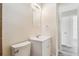 Small bathroom with toilet and vanity at 831 Searcy Ave, Sarasota, FL 34237