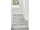 Clean hallway with wood-look flooring at 831 Searcy Ave, Sarasota, FL 34237