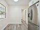 Updated kitchen features stainless steel appliances and modern cabinetry at 831 Searcy Ave, Sarasota, FL 34237