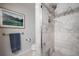 Clean bathroom with marble shower and updated fixtures at 50 Coe Rd # 311, Belleair, FL 33756