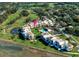 Aerial view showcasing condo location, pool, and golf course at 50 Coe Rd # 311, Belleair, FL 33756