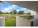 Private balcony overlooking a beautifully landscaped golf course at 50 Coe Rd # 311, Belleair, FL 33756