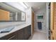 Modern bathroom with marble vanity, shower, and updated fixtures at 50 Coe Rd # 311, Belleair, FL 33756