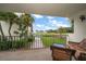 Relaxing balcony with patio furniture and scenic golf course view at 50 Coe Rd # 311, Belleair, FL 33756
