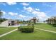 Aerial view of community pool and grounds at 50 Coe Rd # 311, Belleair, FL 33756