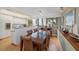 Kitchen features a breakfast bar and adjacent dining area with wood table and chairs at 50 Coe Rd # 311, Belleair, FL 33756