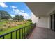 Private balcony overlooking a beautifully landscaped golf course at 50 Coe Rd # 311, Belleair, FL 33756
