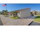 Community building with a brick walkway and landscaping at 50 Coe Rd # 311, Belleair, FL 33756