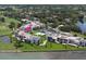 Aerial view of condo complex near golf course and waterfront at 50 Coe Rd # 311, Belleair, FL 33756