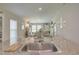 Modern kitchen with white cabinets, granite countertops, and stainless steel appliances at 13043 Pennybrook Dr, Riverview, FL 33579
