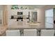 Modern kitchen with white cabinets, granite countertops, and stainless steel appliances at 13043 Pennybrook Dr, Riverview, FL 33579