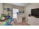 bedroom with twin bed, desk, and plenty of storage at 13043 Pennybrook Dr, Riverview, FL 33579