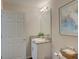 Bright bathroom features a granite countertop and updated fixtures at 13043 Pennybrook Dr, Riverview, FL 33579