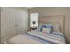 Bedroom with a queen bed, nightstand and double doors to closet at 13043 Pennybrook Dr, Riverview, FL 33579