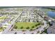Aerial view showcasing a neighborhood's layout and green spaces at 13043 Pennybrook Dr, Riverview, FL 33579